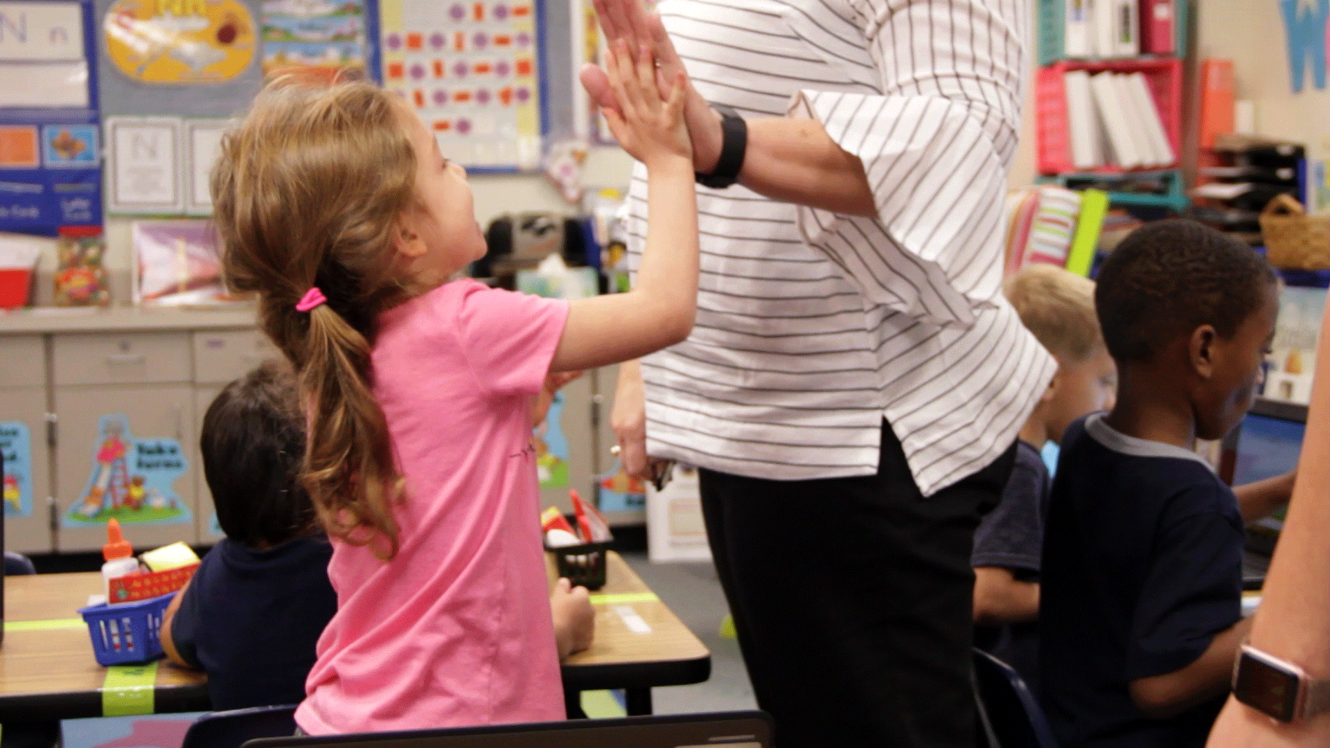 student-girl-teacher-high-five